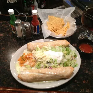 Chicken &amp; Beef Flautas with rice &amp; beans. And Negra Modelo on draft. Tres Portrillos is the best.