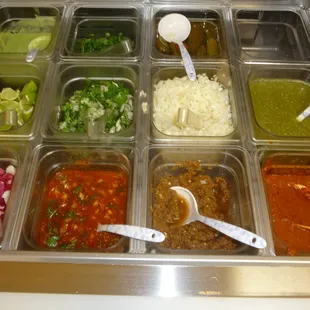 a variety of condiments in containers