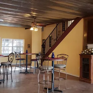 the interior of a home with a staircase leading to the second floor
