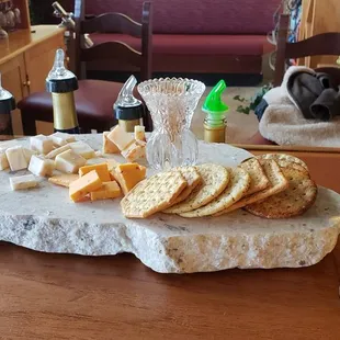 cheese and crackers on a table