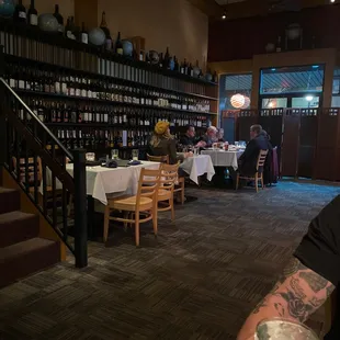 a man sitting at a table in a restaurant
