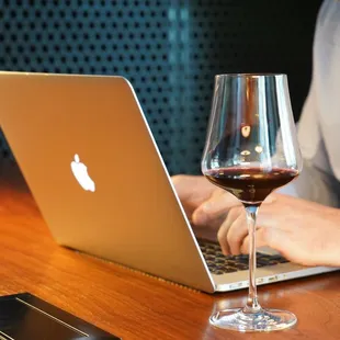 Need to do some work with a glass of wine? We have plenty of work space in addition to social and bar space.