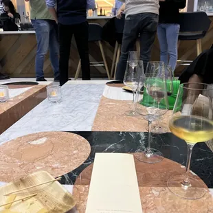 One of the tables near the middle of the restaurant (surrounded by cozy chairs and comfortable benches)