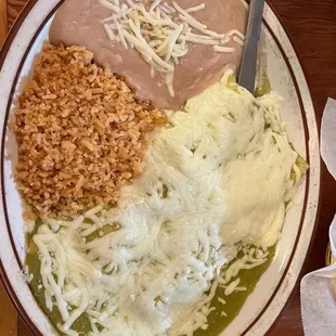Flour enchiladas, rice and beans.