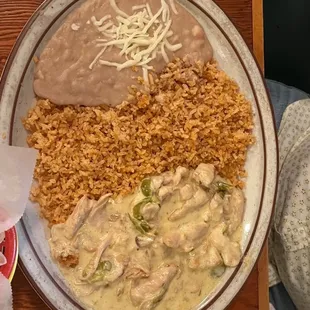 Pollo en su Crema, rice &amp; beans. Fresh tortillas in the foil.