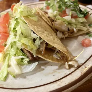 Carnitas taco and fish taco Al La carte