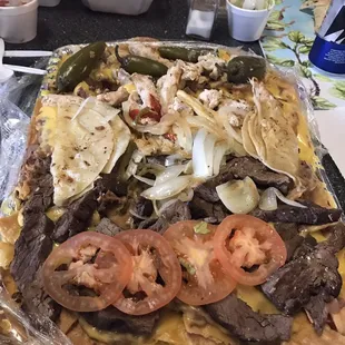 Botana:  chicken and beef fajitas, quesadillas, tostadas, rice  and beans!