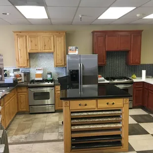 a kitchen with granite countertops