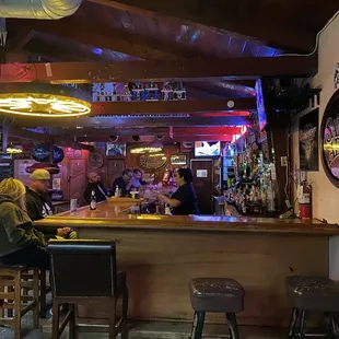 Full bar! The Mormon wagon wheels are now neon lights hanging from the rafters.