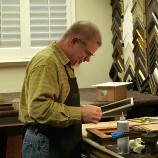 Norm in his framing studio.