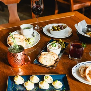 a table with a variety of appetizers