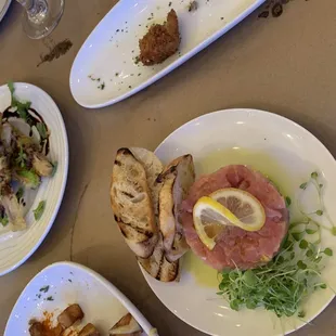 Tartar de Atún y Aguacate (right) &amp; berenjena con melaza (left)