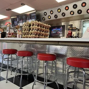 Counter stools seating.  @DriveTriangle IG @TriangleDriveIn . B.O.B Burger Hot Dog French Fries Onion Rings Jalapeo Poppers Malt