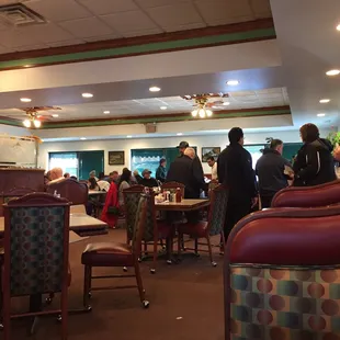 One half of the dining area. Coat hanger to the right side by entrance