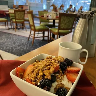 a bowl of fruit and yogurt