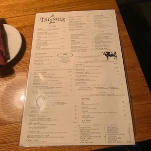 a menu and a plate of food