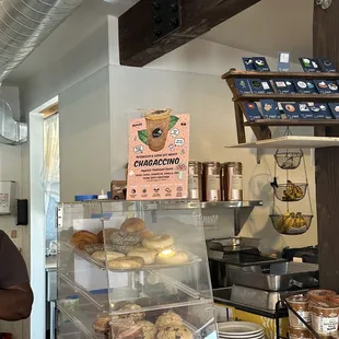 a man standing in front of a counter