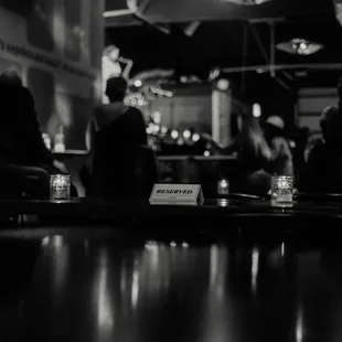 people sitting at a bar