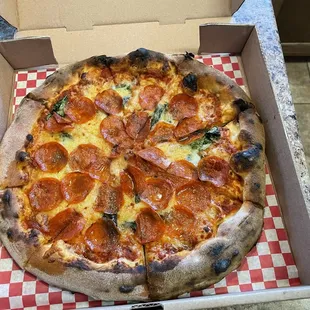 Diavola - house marinara, whole milk mozzarella, pepperoni, basil, red pepper flakes.  So damn good