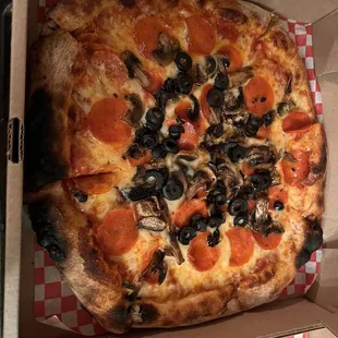 Mushrooms, black olives and pepperonis cooked to perfection.