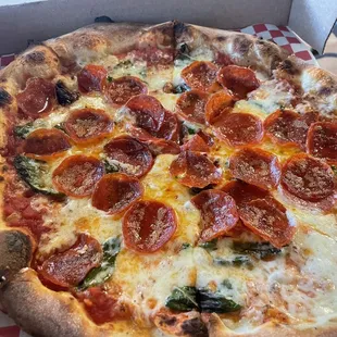 Diavola. House sauce with whole milk mozzarella, pepperoni, basil, and red pepper flakes.  Sooo good. Fresh ingredients make it great.