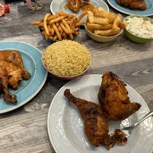 Family platter with rice, peri peri fries and Yucca, coleslaw.