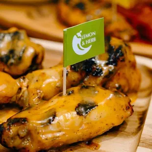 a green flag on a wooden cutting board