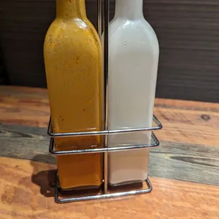 two bottles of mustard