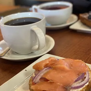 Lox Everything Bagel with Earl Grey tea and Black Coffee.
