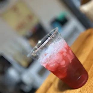 a close up of a drink on a table