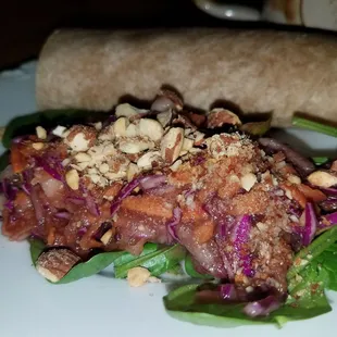 Hummus wrap &amp; nut based cole slaw.