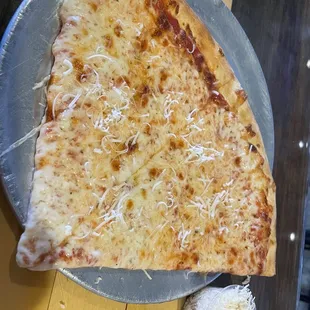 Cheese slice for lunch special with fresh grated parmigiana