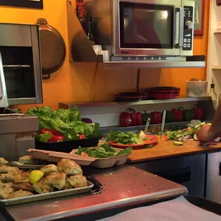 a man preparing food in a kitchen