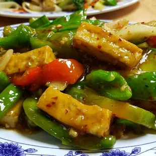Hot &amp; spicy tofu w/lemongrass ($14). Spicy, but also super oily and gloopy.