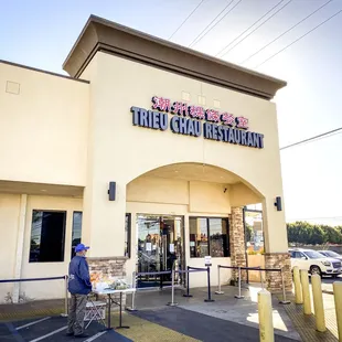 a woman walking out of the building