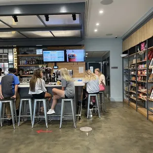 people sitting at the bar