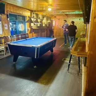 Dart boards and pool table