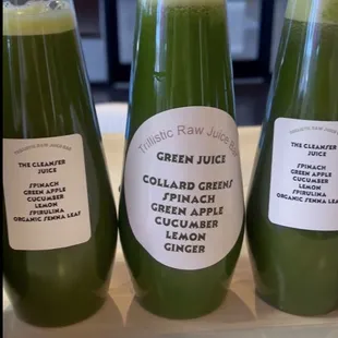 three bottles of cold pressed green juice