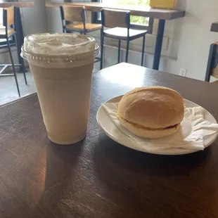 Egg and cheese sandwich with iced lavender honey latte