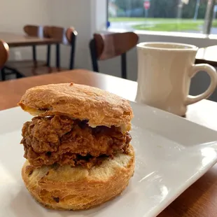 Fried buttermilk chicken on a maple bacon biscuit with cayenne maple syrup.
