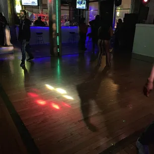 people dancing on the dance floor