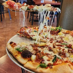 a slice being lifted by a spatula