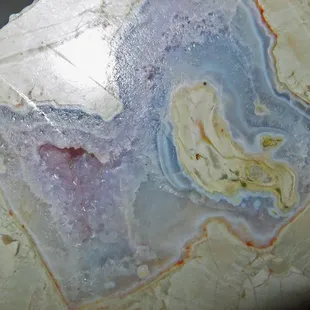 Amethyst geode from Mine d'agates du Mont Lyall, Quebec, Canada, one geode split in two pictures.  About 5" across.