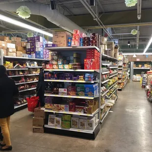 a woman shopping in a grocery store
