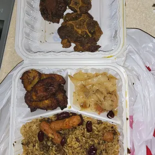 Stewed Oxtail Platter with rice &amp; peas, stewed cabbage, and plantains.
