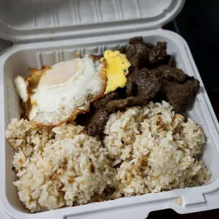 a meal in a styrofoam container