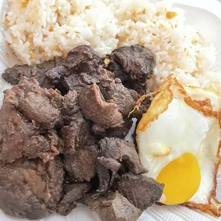 Tapa, fried eggs (itlog) and garlic fried rice -- aka tapsilog