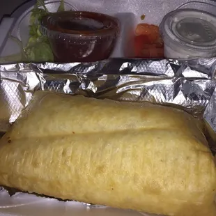 Should have cut it first -- chicken chimichanga. Loads of cheese inside.