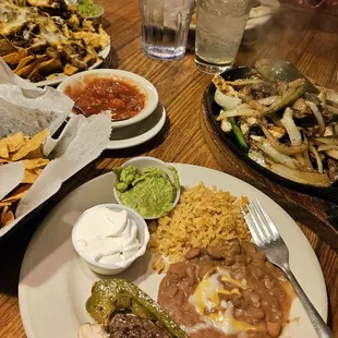 a table full of mexican food