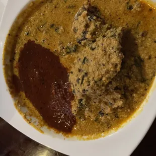 Egusi Soup with goat meat and stew